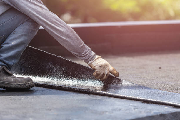Professional Basement Waterproofing technician working in Farmingdale, NJ